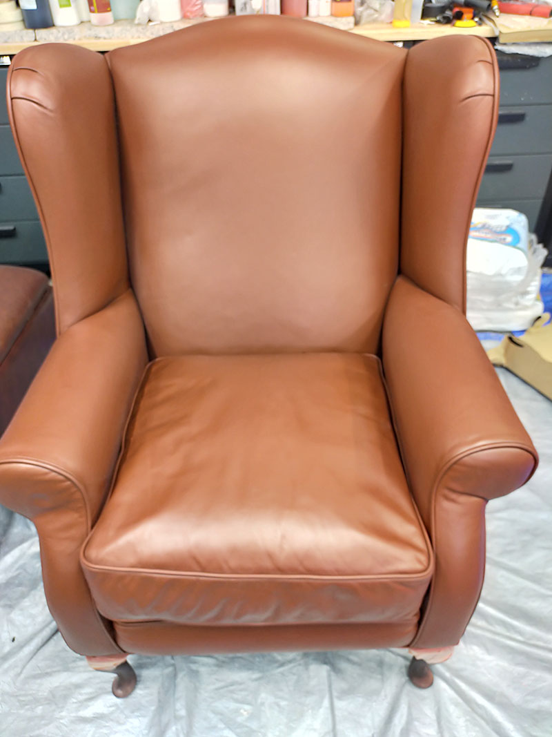 Laura Ashley leather wingback chair restoration project after image