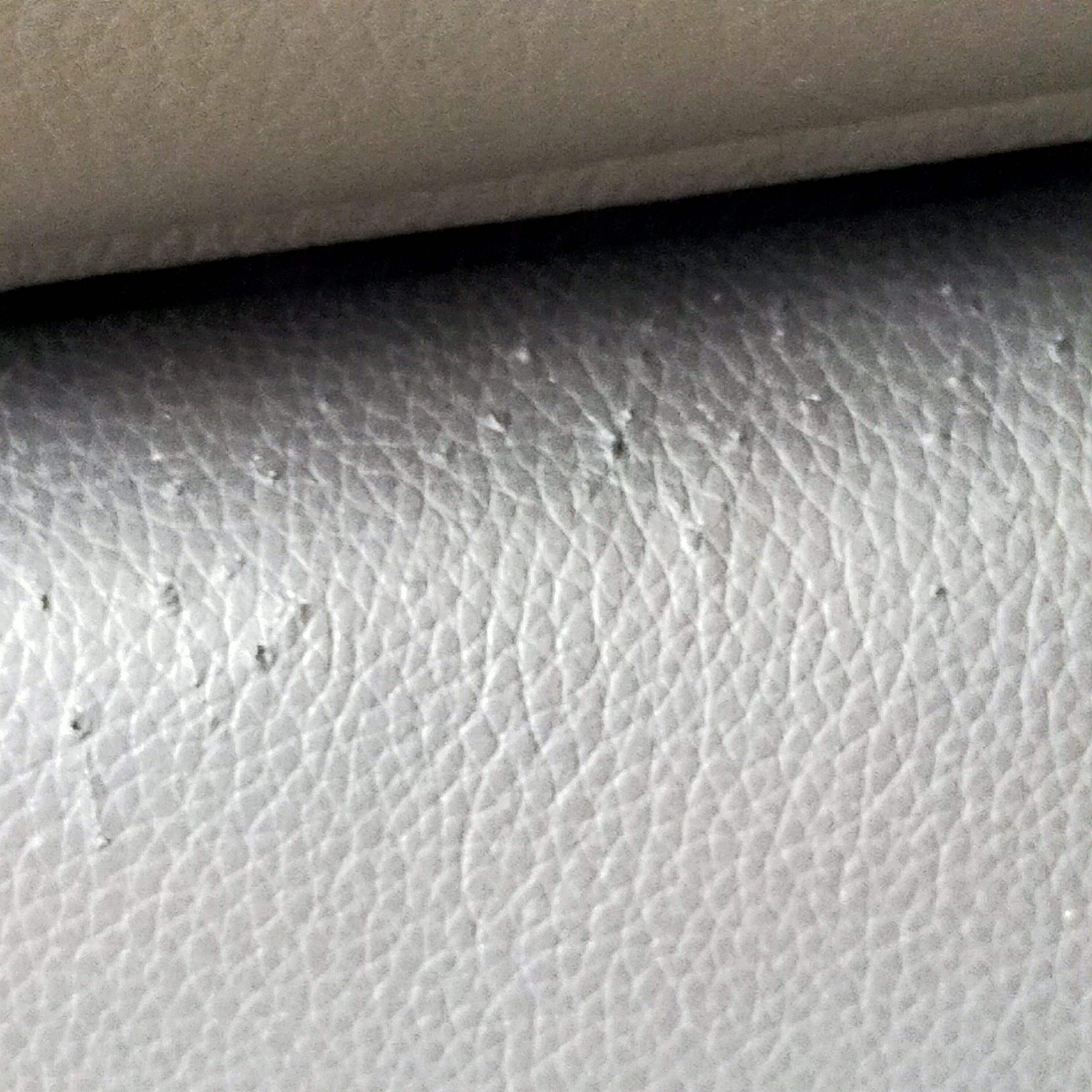 cat scratches on corner leather sofa in Sheffield prior to restoration